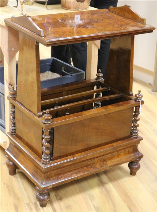 An unusual Victorian walnut Canterbury with shelf above and a concealed drawer to the base W.61cm